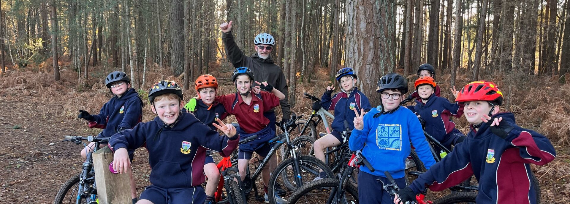 students on bikes in the forest